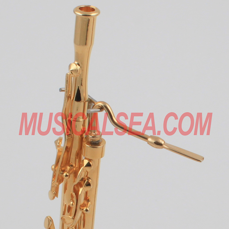 miniature brass musical instrument